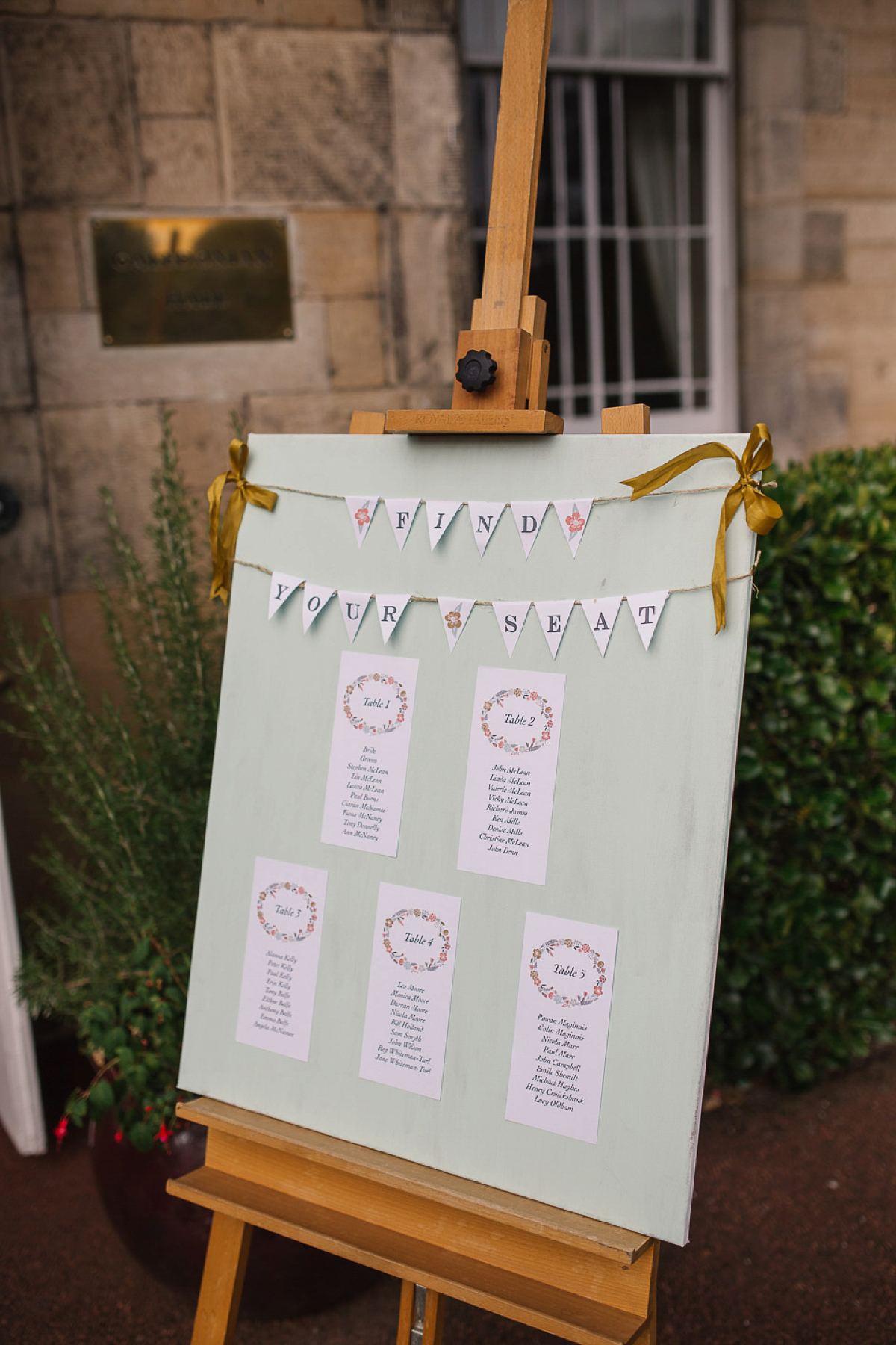 Julia wore a gown by Rowanjoy and a pair of green wedding shoes for her Royal Botanical Gardens wedding in Edinburgh. Photography by Jen Owens.