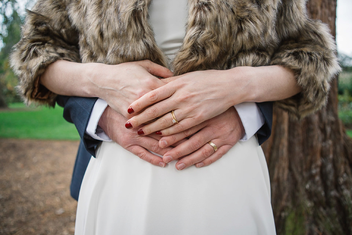 Julia wore a gown by Rowanjoy and a pair of green wedding shoes for her Royal Botanical Gardens wedding in Edinburgh. Photography by Jen Owens.