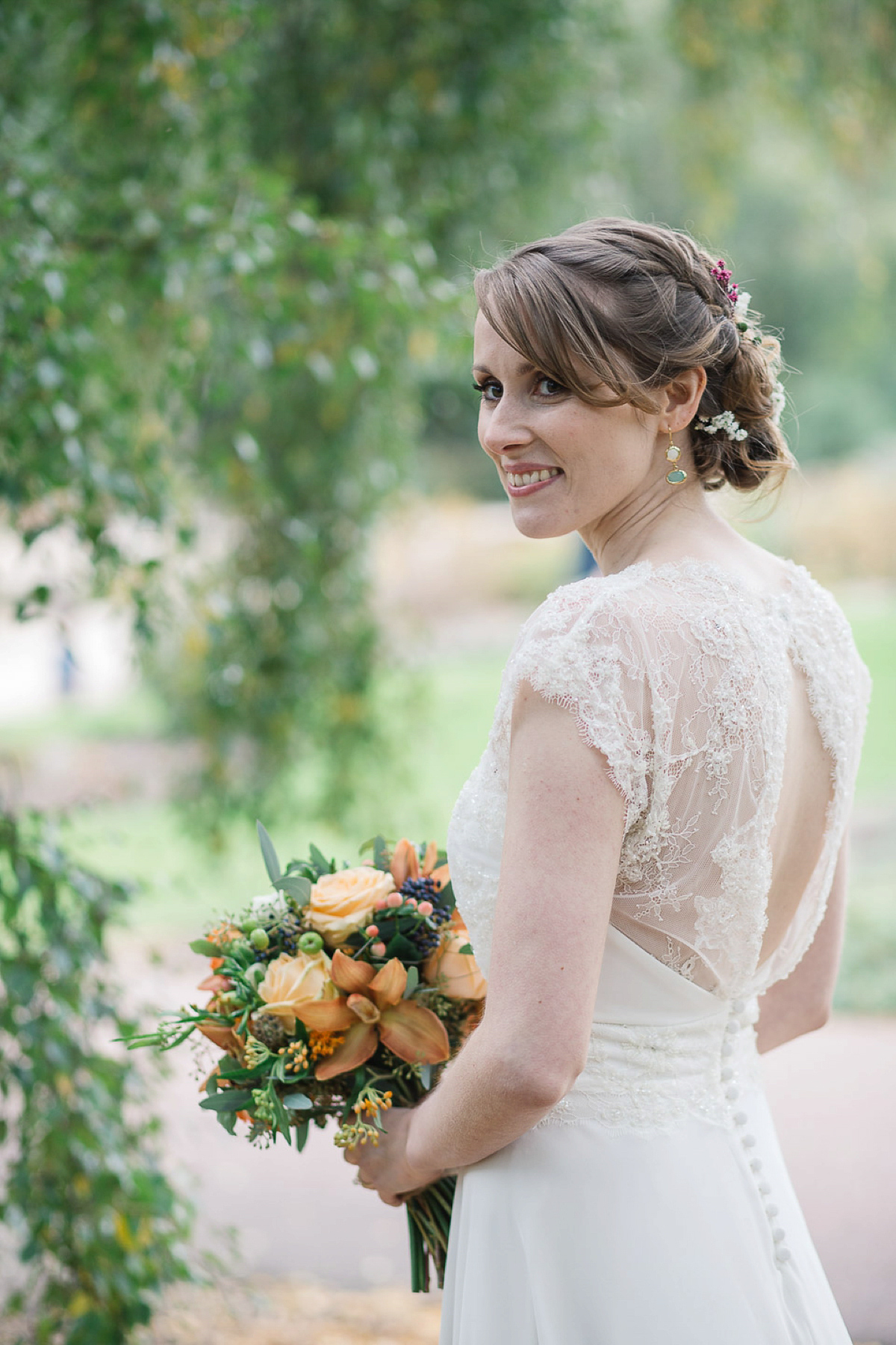 Julia wore a gown by Rowanjoy and a pair of green wedding shoes for her Royal Botanical Gardens wedding in Edinburgh. Photography by Jen Owens.