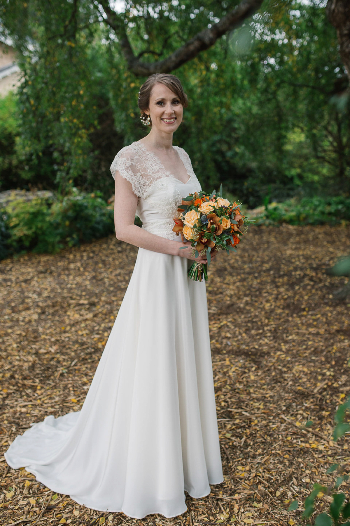 Julia wore a gown by Rowanjoy and a pair of green wedding shoes for her Royal Botanical Gardens wedding in Edinburgh. Photography by Jen Owens.