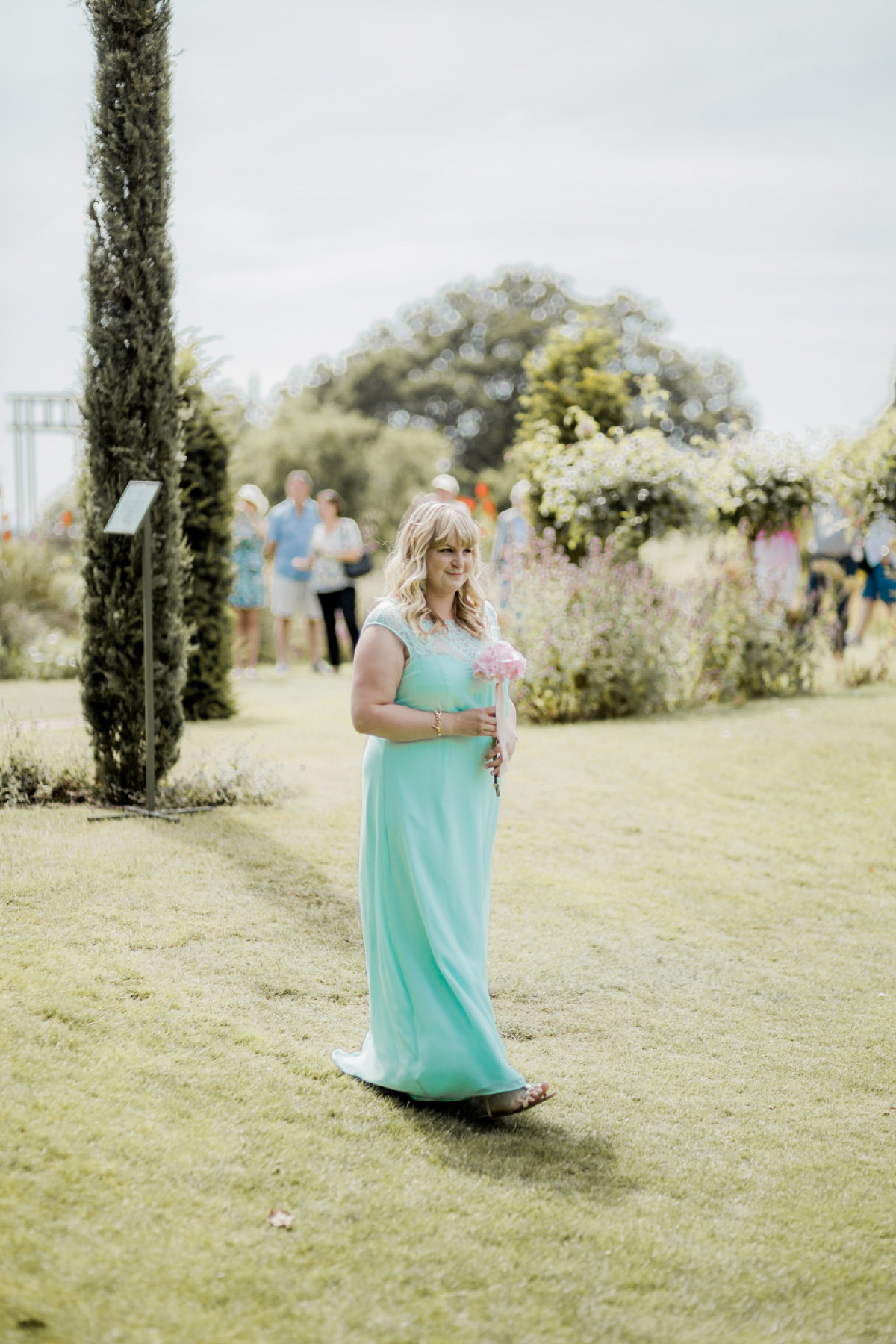 Maggie Sottero for a flower filled country garden wedding. Photography by Naomi Kenton.