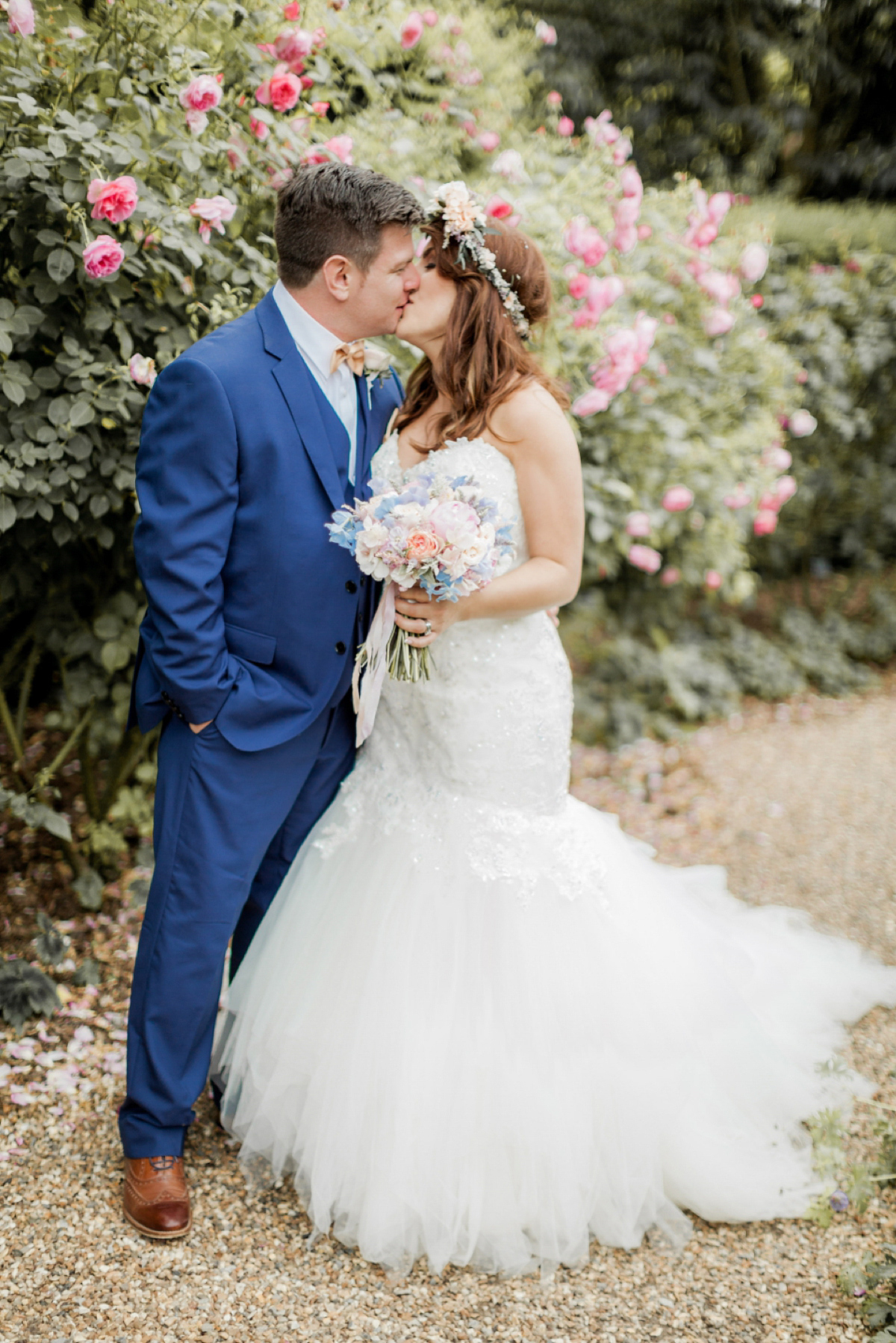 Maggie Sottero for a flower filled country garden wedding. Photography by Naomi Kenton.