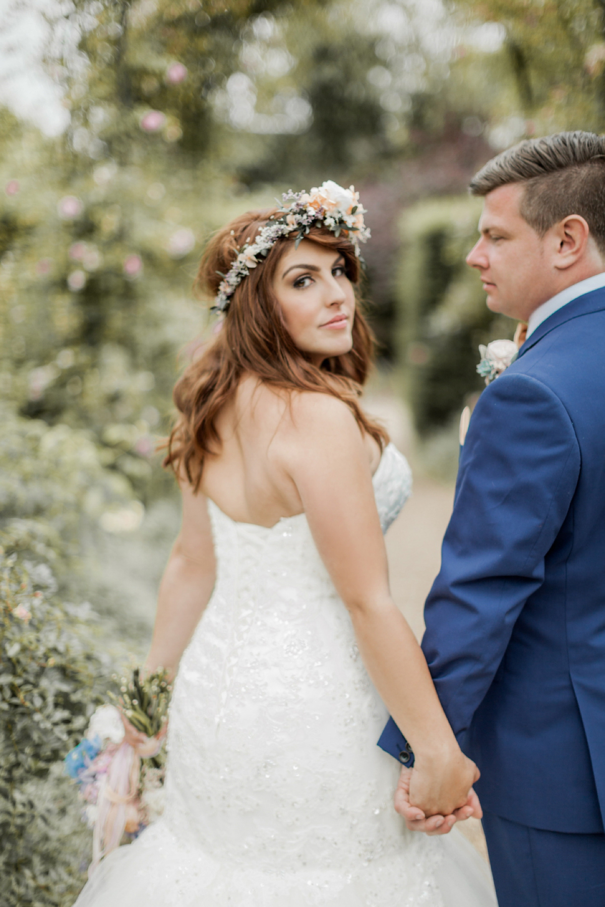 Maggie Sottero for a flower filled country garden wedding. Photography by Naomi Kenton.