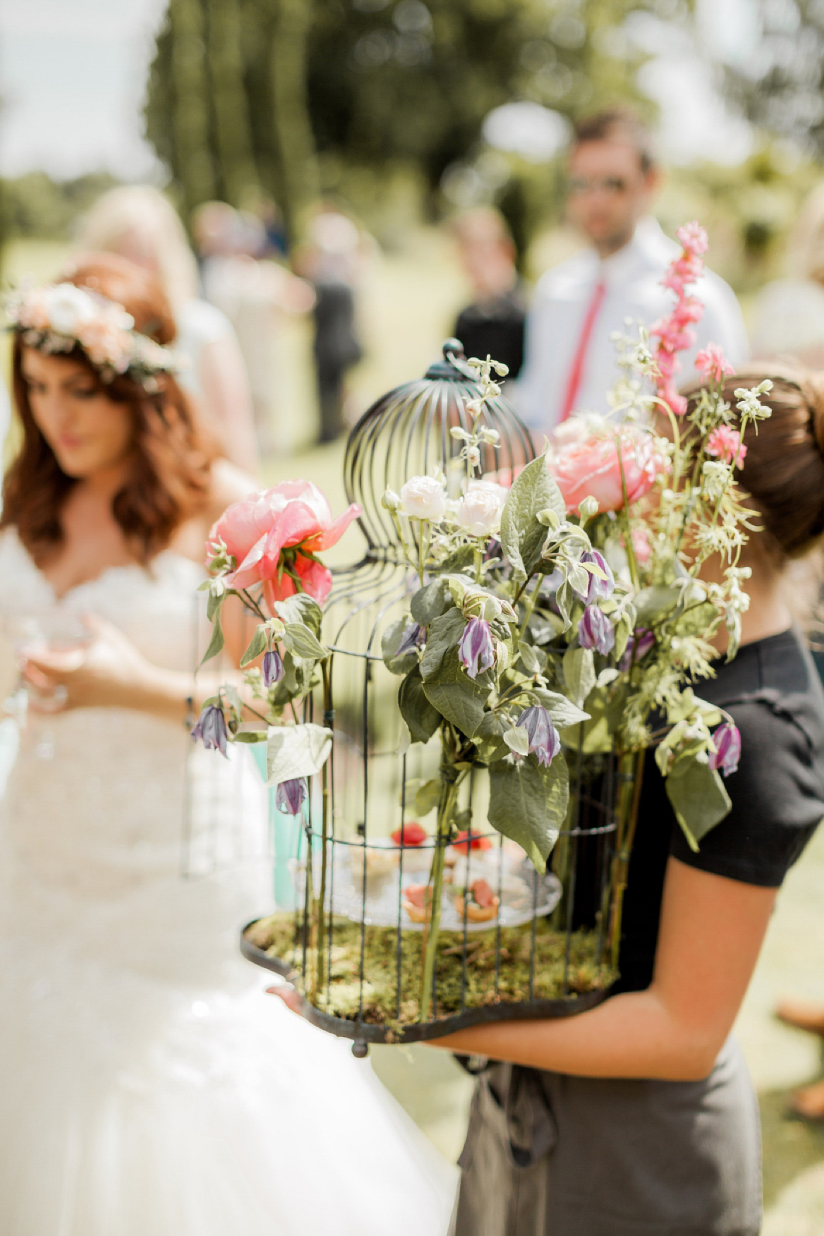 Maggie Sottero for a flower filled country garden wedding. Photography by Naomi Kenton.