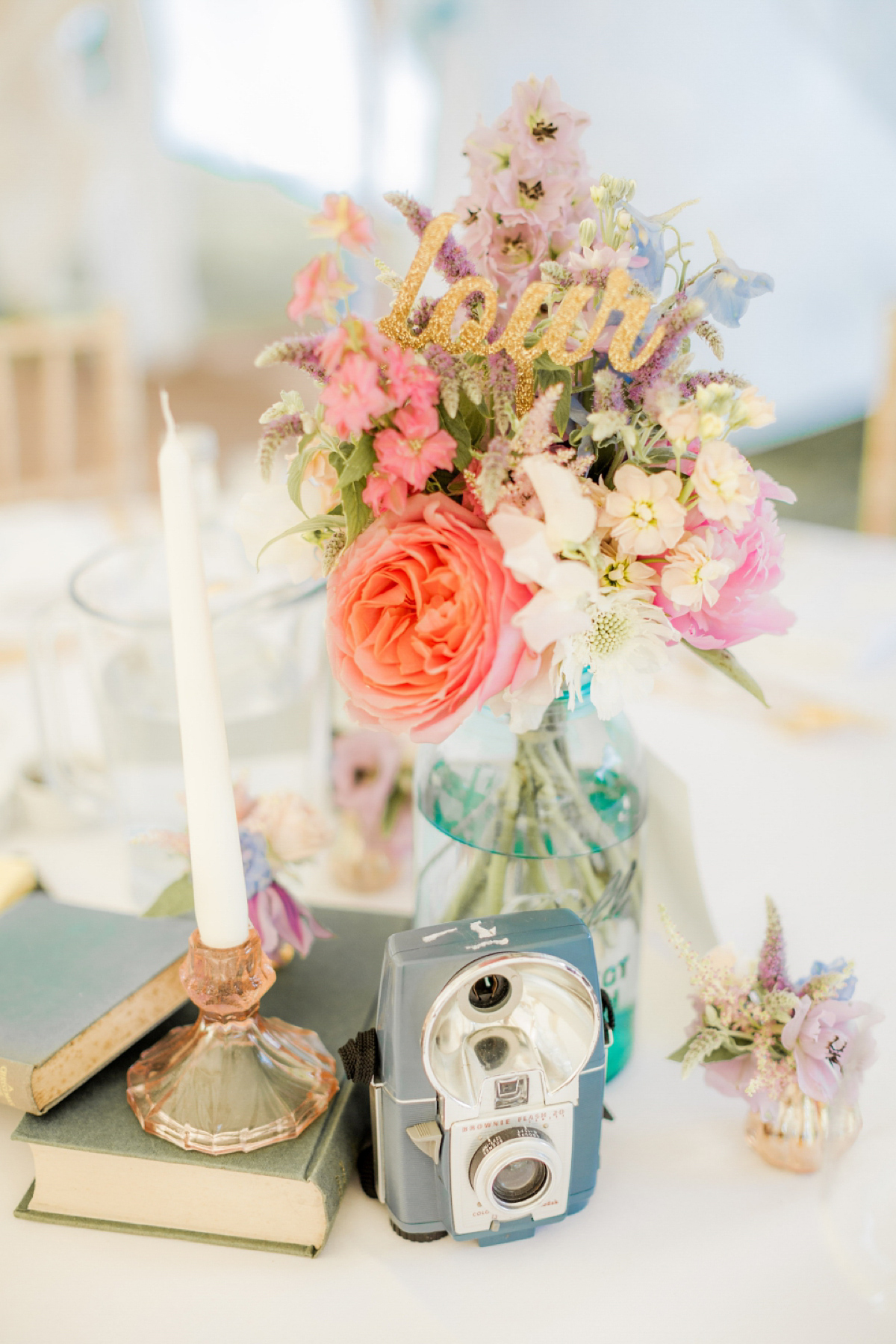 Maggie Sottero for a flower filled country garden wedding. Photography by Naomi Kenton.