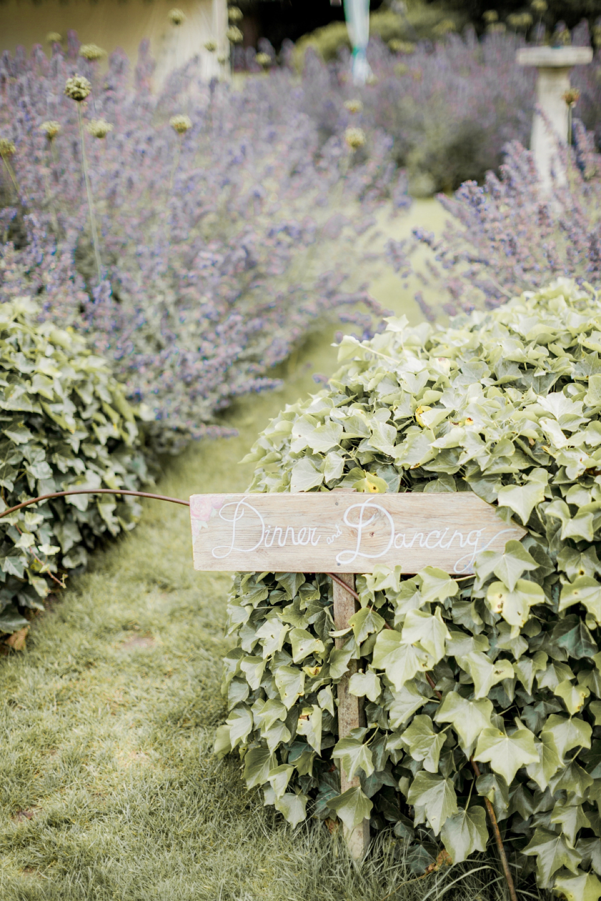 Maggie Sottero for a flower filled country garden wedding. Photography by Naomi Kenton.