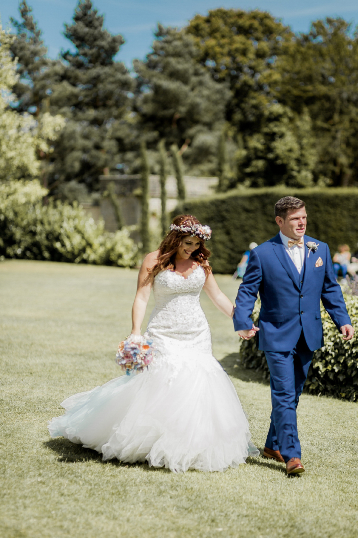 Maggie Sottero for a flower filled country garden wedding. Photography by Naomi Kenton.