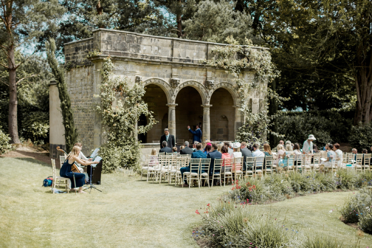 Maggie Sottero for a flower filled country garden wedding. Photography by Naomi Kenton.