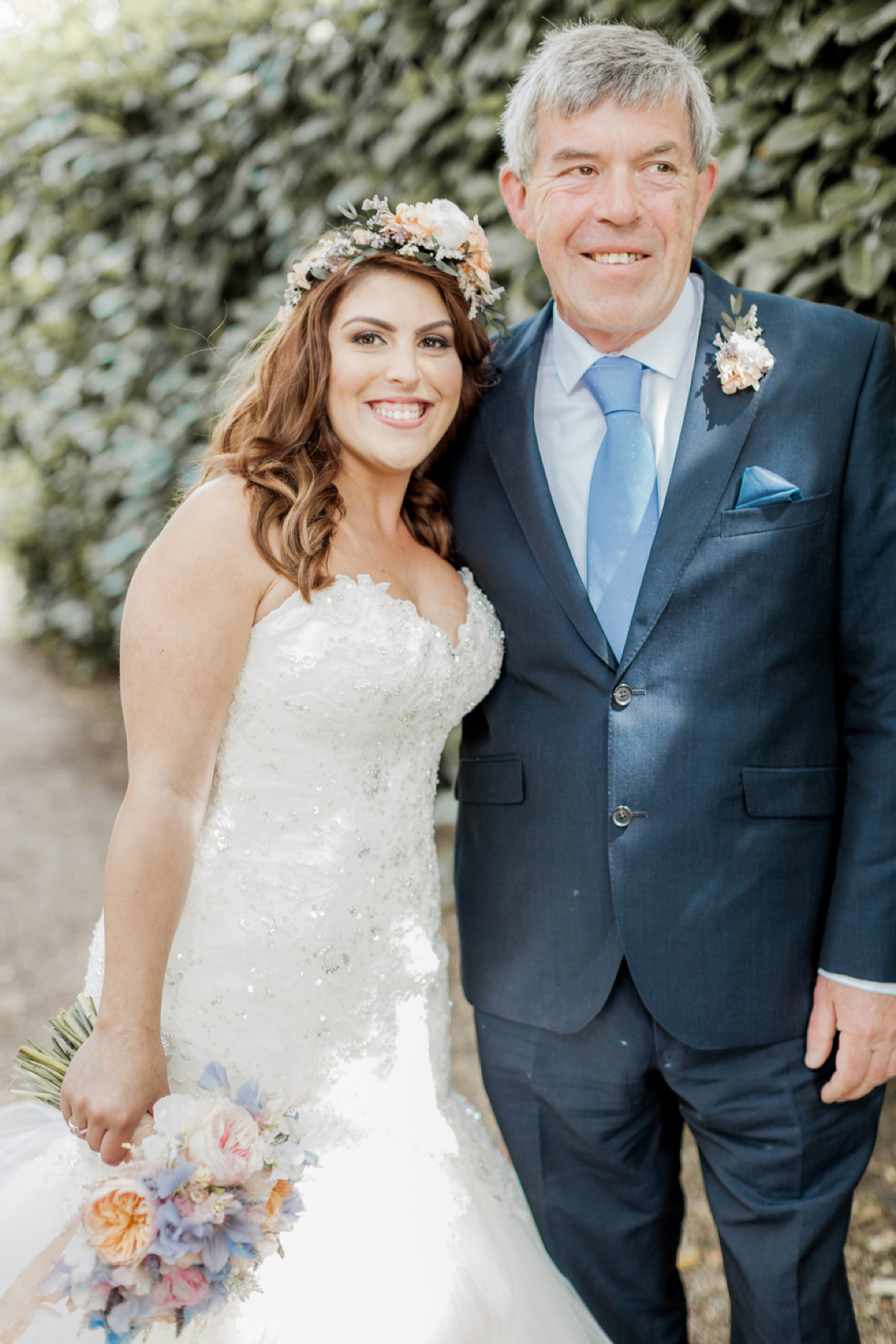 Maggie Sottero for a flower filled country garden wedding. Photography by Naomi Kenton.