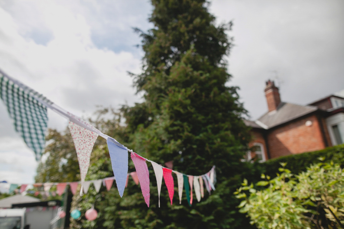 Bride Leah wears a Watters gown for her romantic and pretty English country garden wedding. Photography by Sally T.