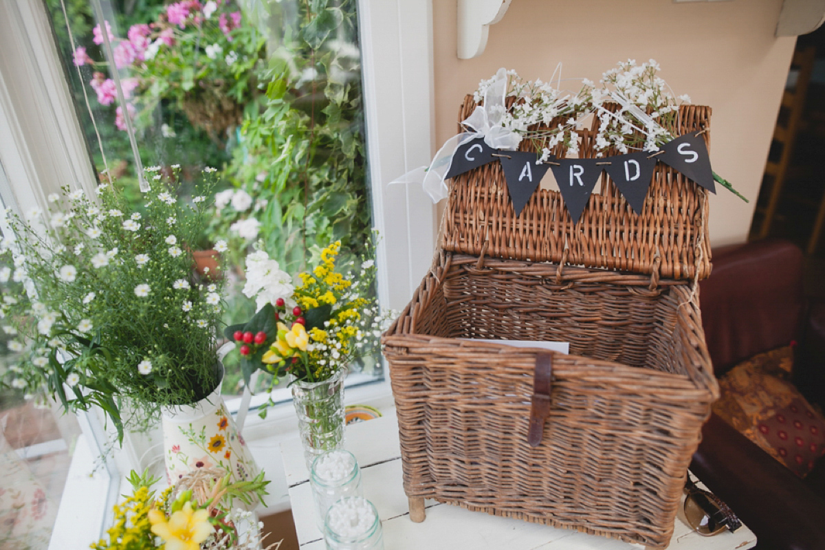 Bride Leah wears a Watters gown for her romantic and pretty English country garden wedding. Photography by Sally T.