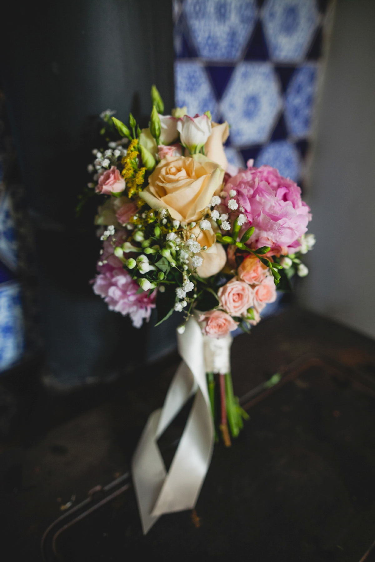 Bride Leah wears a Watters gown for her romantic and pretty English country garden wedding. Photography by Sally T.