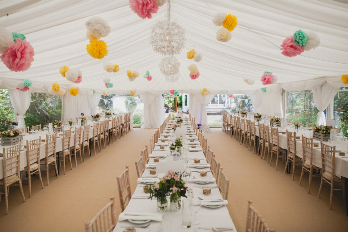 Bride Leah wears a Watters gown for her romantic and pretty English country garden wedding. Photography by Sally T.