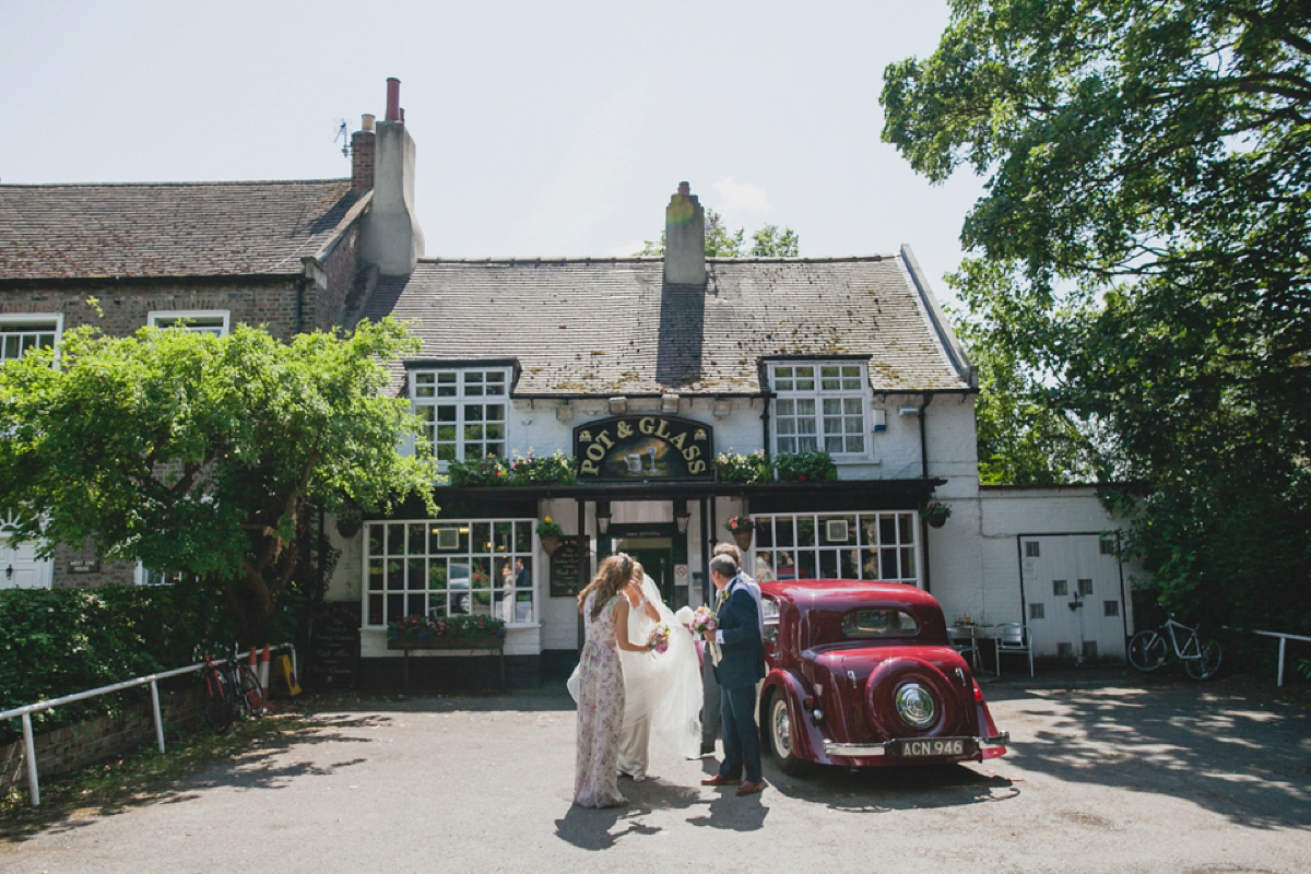 Bride Leah wears a Watters gown for her romantic and pretty English country garden wedding. Photography by Sally T.