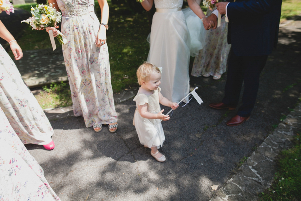 Bride Leah wears a Watters gown for her romantic and pretty English country garden wedding. Photography by Sally T.