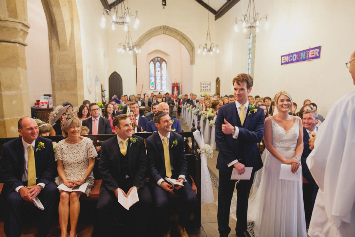 Bride Leah wears a Watters gown for her romantic and pretty English country garden wedding. Photography by Sally T.