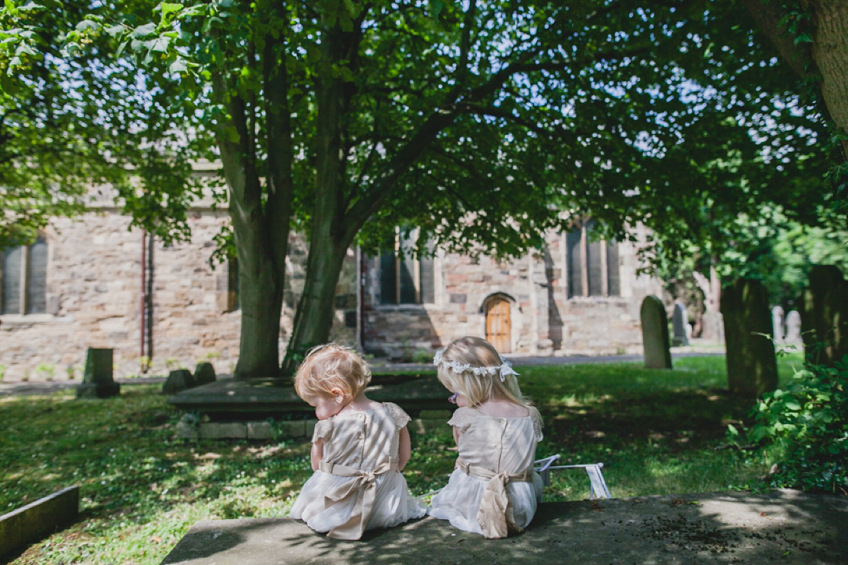 Bride Leah wears a Watters gown for her romantic and pretty English country garden wedding. Photography by Sally T.