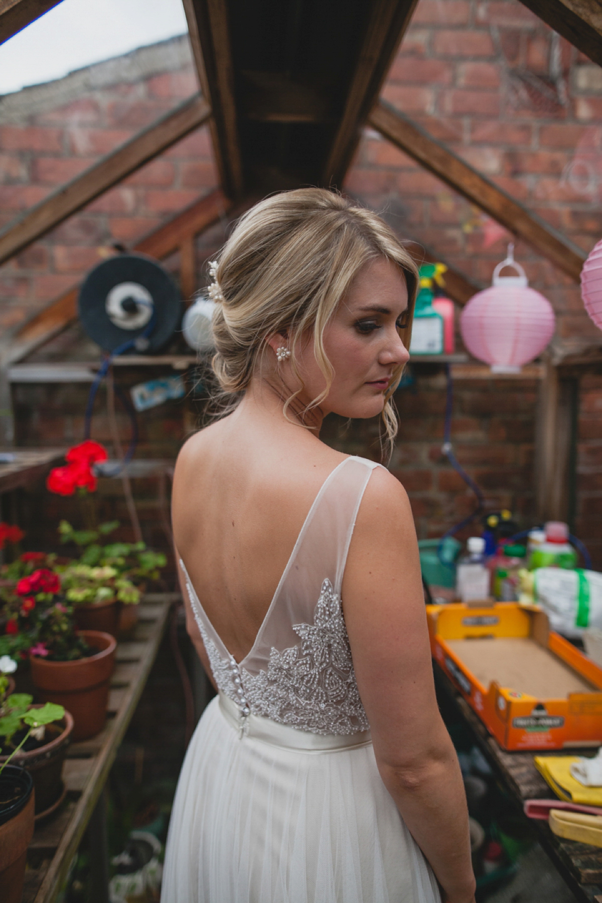 Bride Leah wears a Watters gown for her romantic and pretty English country garden wedding. Photography by Sally T.