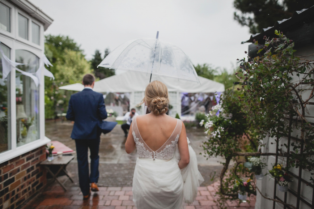 Bride Leah wears a Watters gown for her romantic and pretty English country garden wedding. Photography by Sally T.