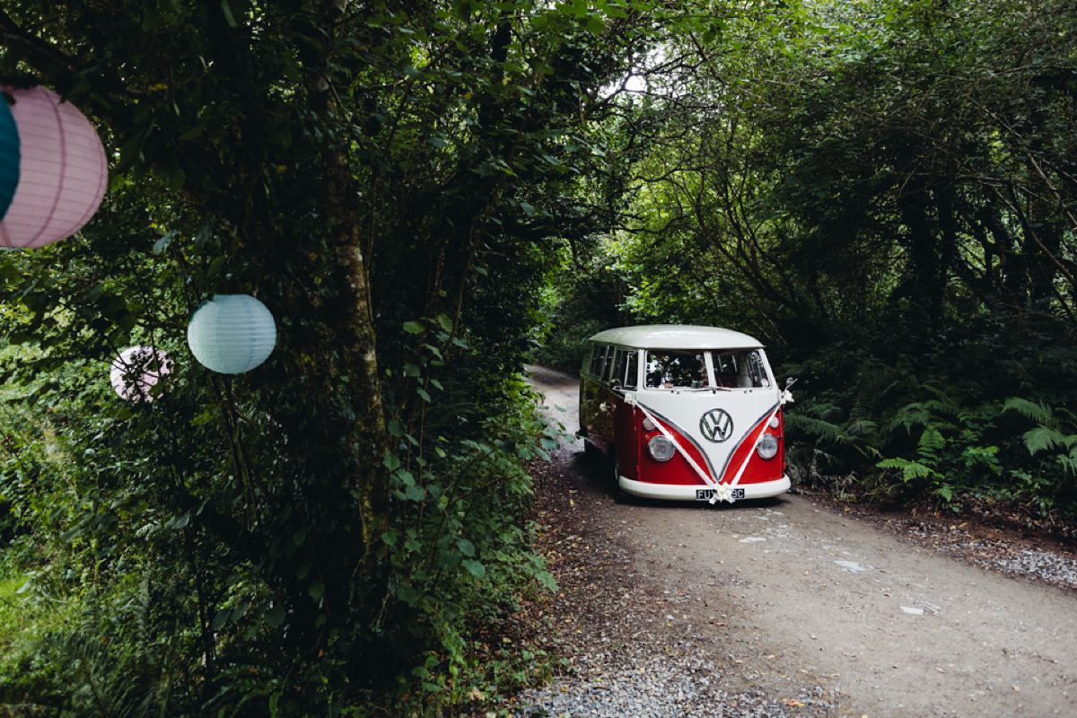 A backless Charlie Brear gown for a festival style tipi wedding in Cornwall. Photography by Lucy Little.