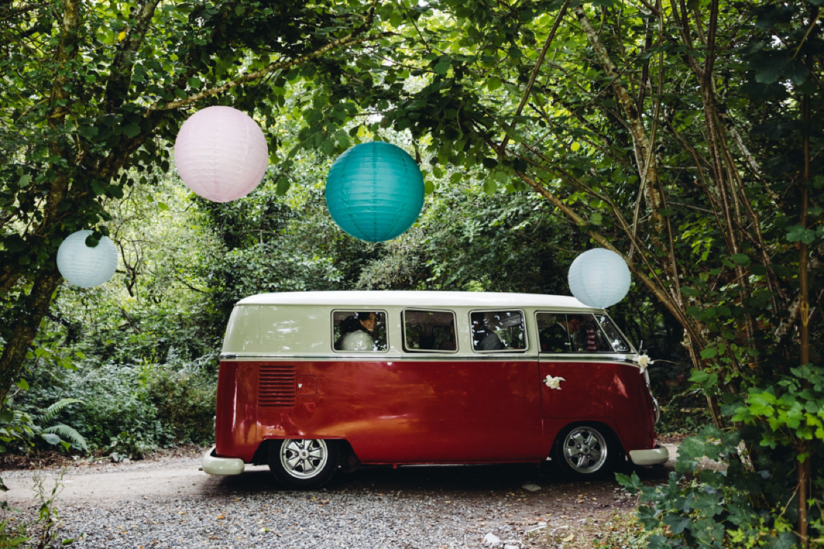 A backless Charlie Brear gown for a festival style tipi wedding in Cornwall. Photography by Lucy Little.