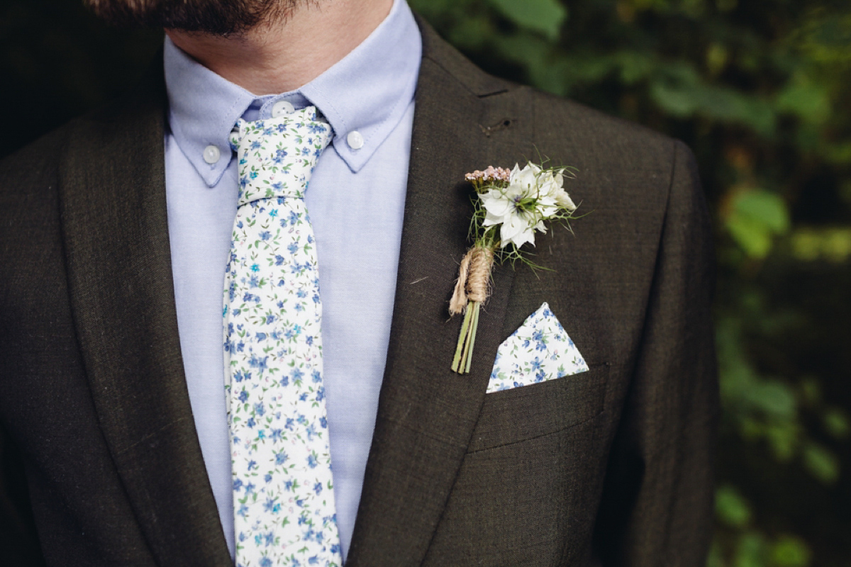 A backless Charlie Brear gown for a festival style tipi wedding in Cornwall. Photography by Lucy Little.