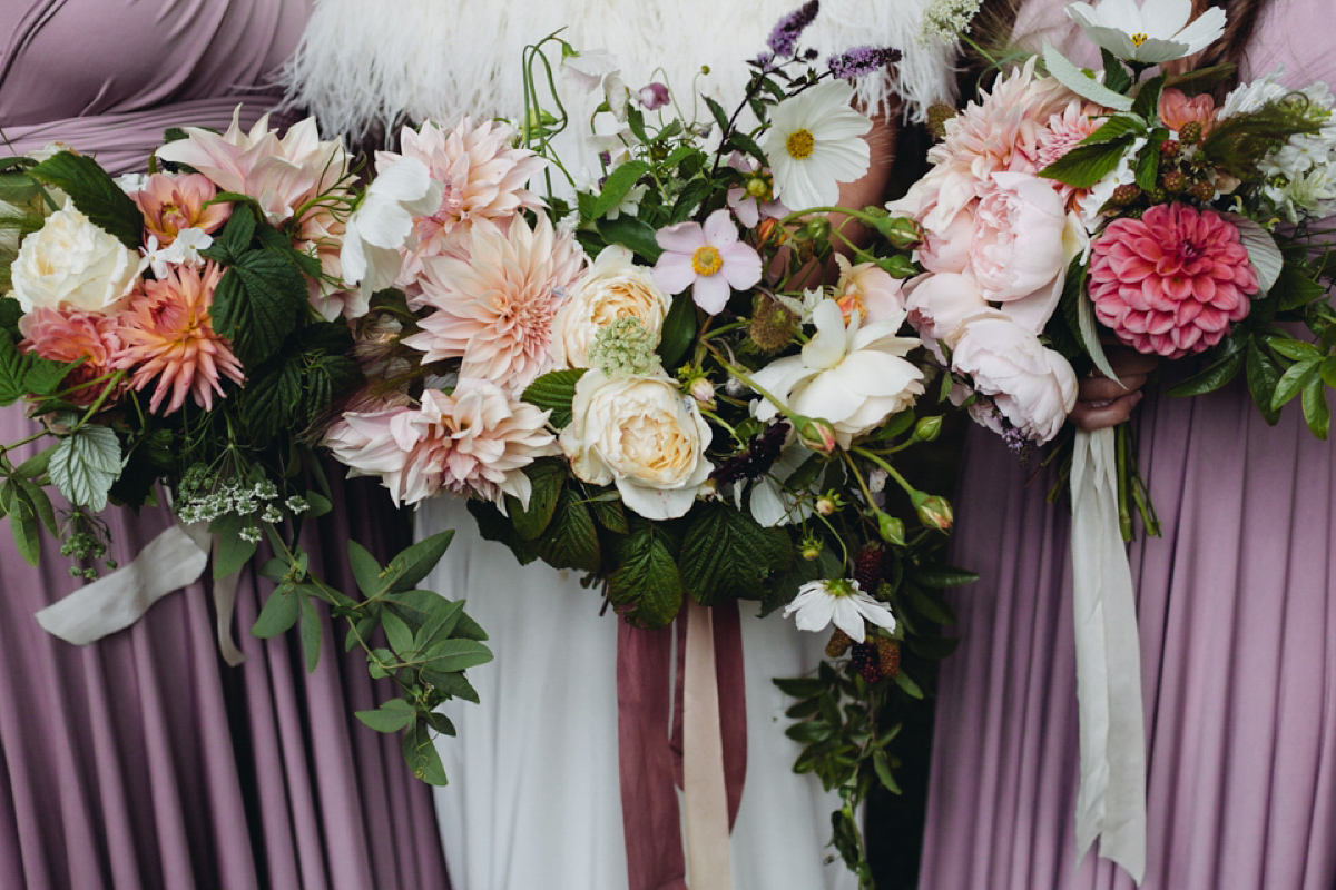 A backless Charlie Brear gown for a festival style tipi wedding in Cornwall. Photography by Lucy Little.