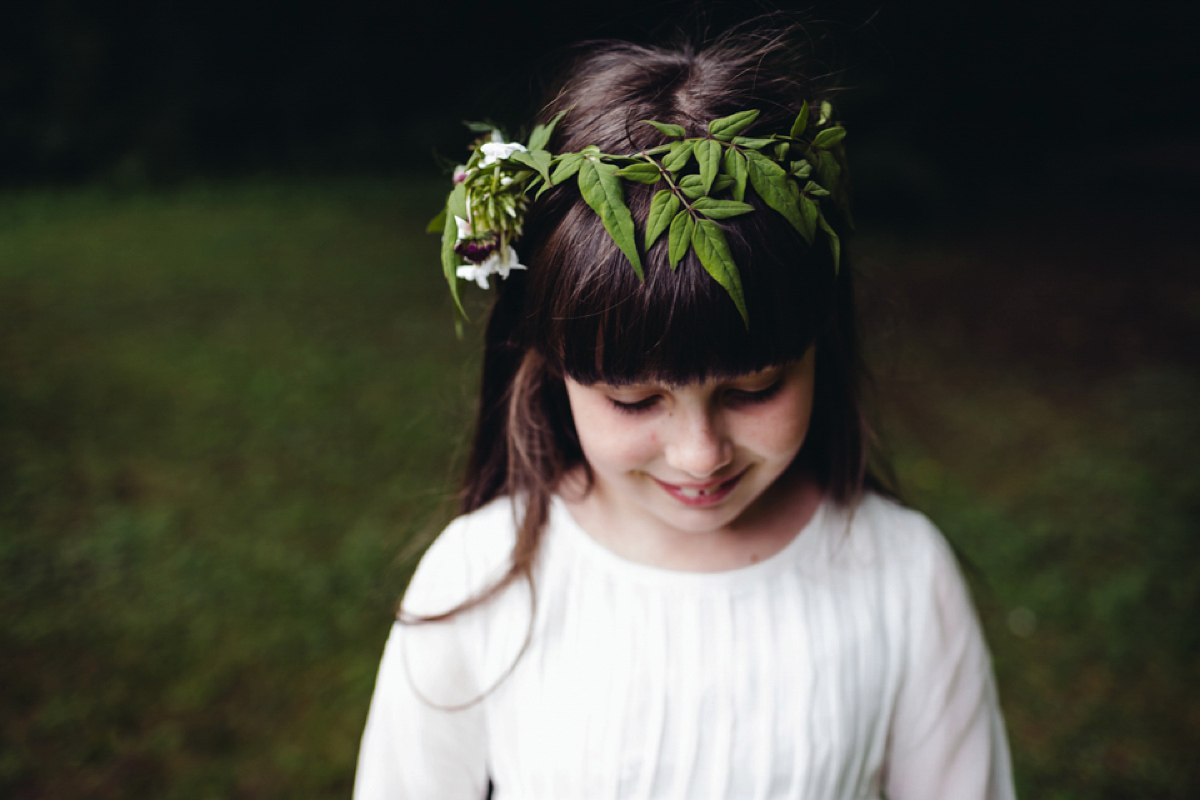 A backless Charlie Brear gown for a festival style tipi wedding in Cornwall. Photography by Lucy Little.