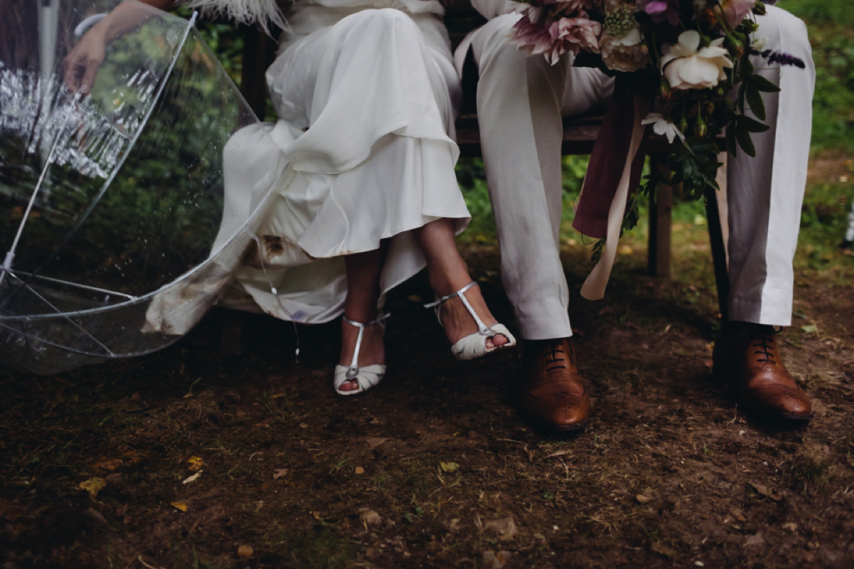 A backless Charlie Brear gown for a festival style tipi wedding in Cornwall. Photography by Lucy Little.