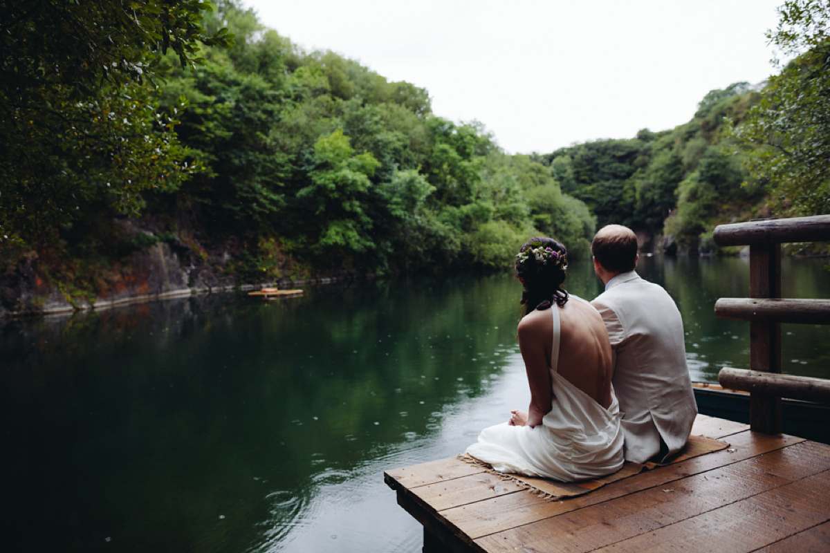 A backless Charlie Brear gown for a festival style tipi wedding in Cornwall. Photography by Lucy Little.