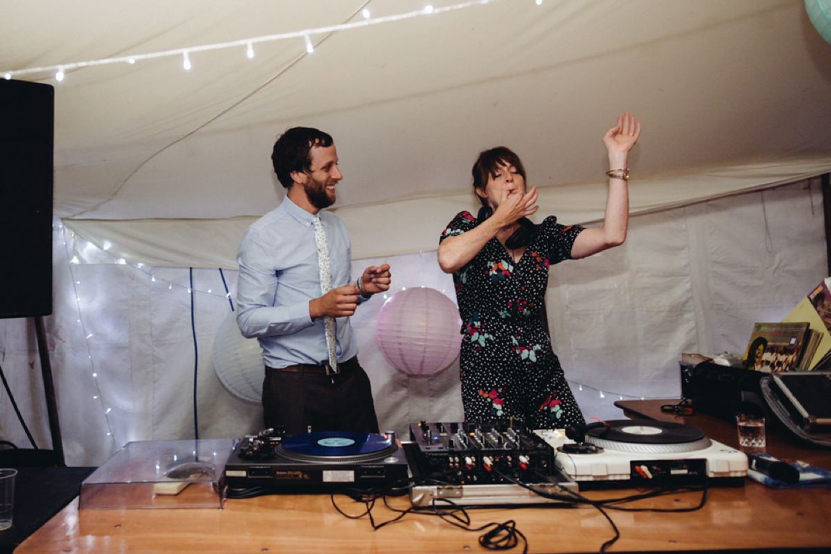 A backless Charlie Brear gown for a festival style tipi wedding in Cornwall. Photography by Lucy Little.