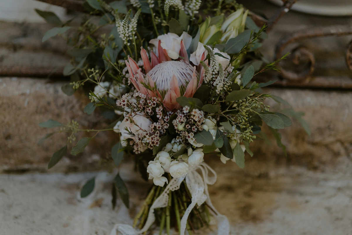 Erica wears a Grace Loves Lace gown for her elegant and bohemian inspired wedding in the south of Italy. Photography by Cinzia Bruschini.