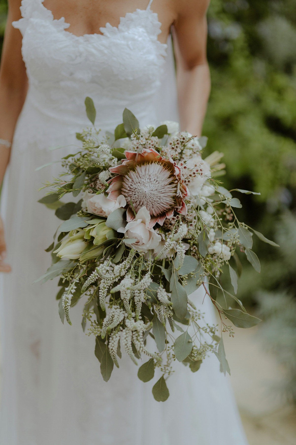 Erica wears a Grace Loves Lace gown for her elegant and bohemian inspired wedding in the south of Italy. Photography by Cinzia Bruschini.