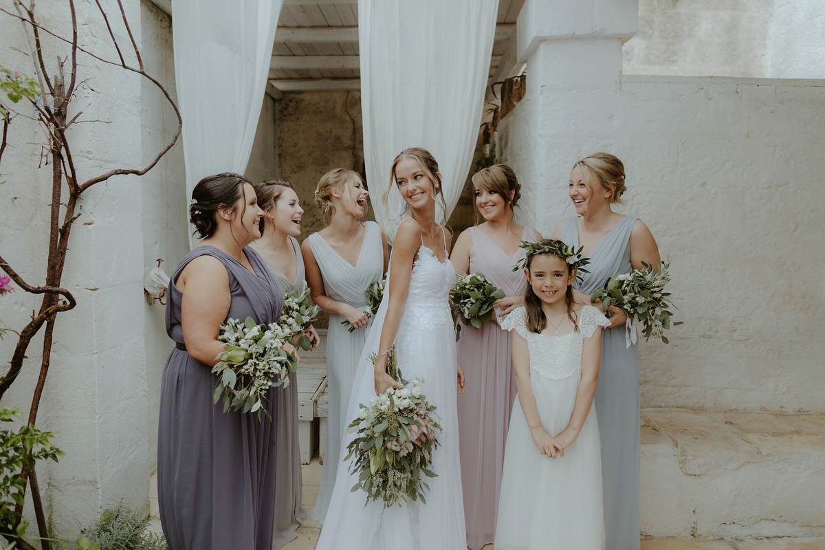 Erica wears a Grace Loves Lace gown for her elegant and bohemian inspired wedding in the south of Italy. Photography by Cinzia Bruschini.