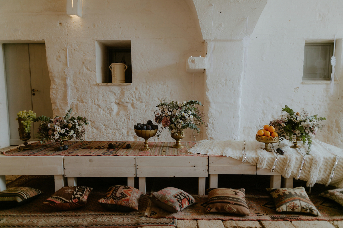 Erica wears a Grace Loves Lace gown for her elegant and bohemian inspired wedding in the south of Italy. Photography by Cinzia Bruschini.