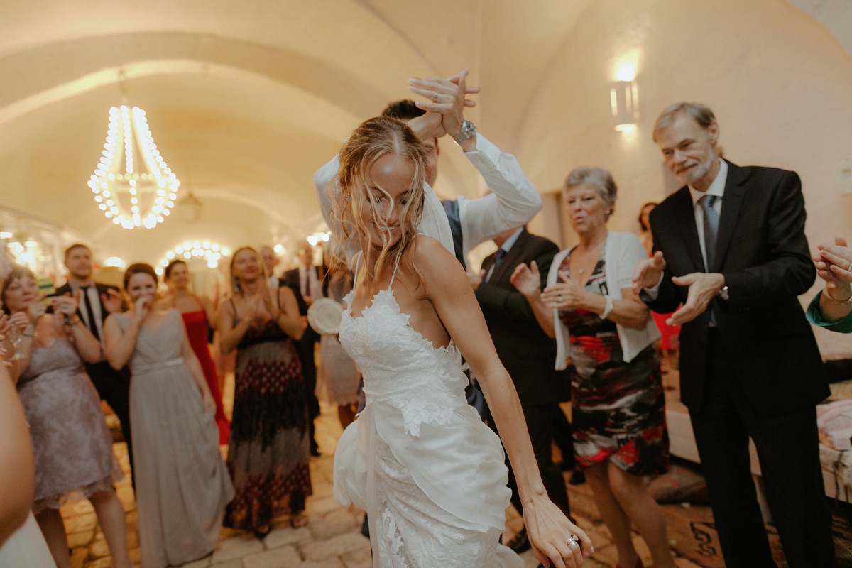 Erica wears a Grace Loves Lace gown for her elegant and bohemian inspired wedding in the south of Italy. Photography by Cinzia Bruschini.