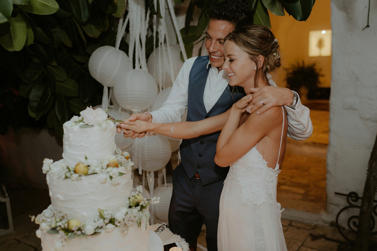 Erica wears a Grace Loves Lace gown for her elegant and bohemian inspired wedding in the south of Italy. Photography by Cinzia Bruschini.