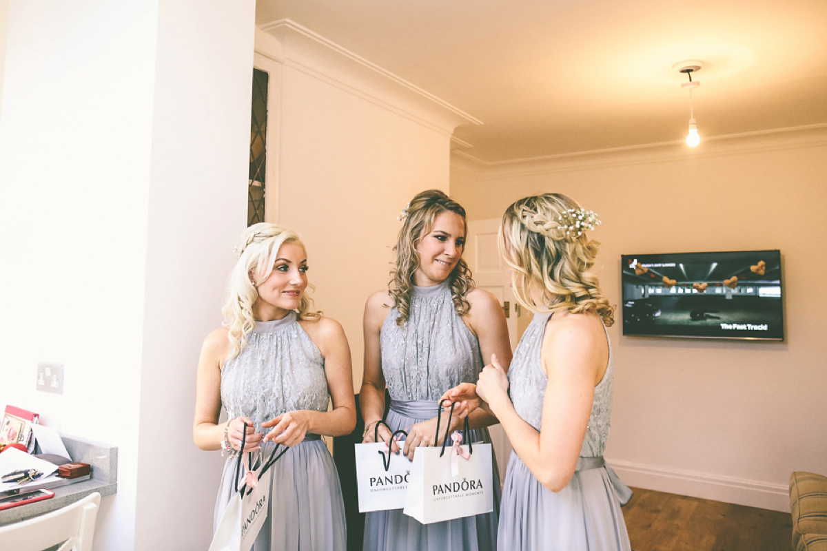 Jess wears an Eliza Jane Howell dress for her winter village hall wedding. Photography by Emma Boileau.