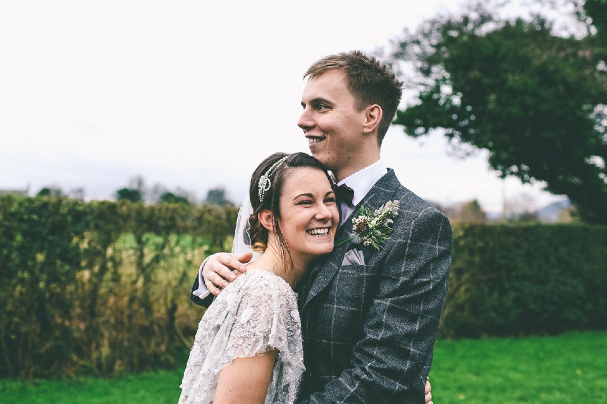 Jess wears an Eliza Jane Howell dress for her winter village hall wedding. Photography by Emma Boileau.