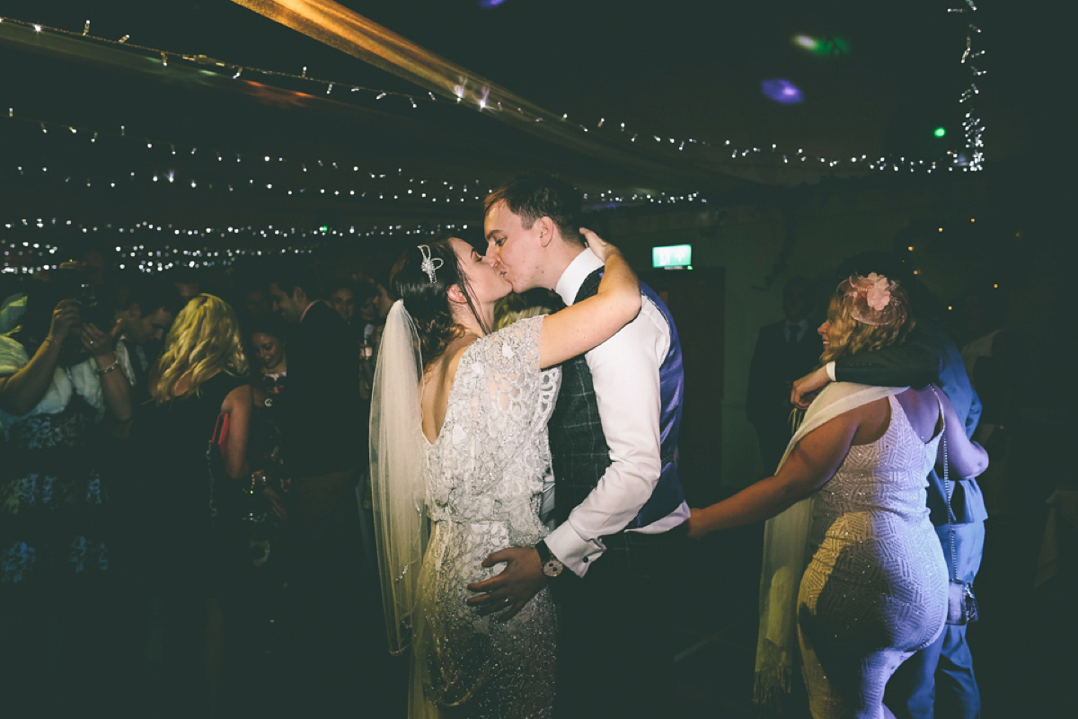 Jess wears an Eliza Jane Howell dress for her winter village hall wedding. Photography by Emma Boileau.