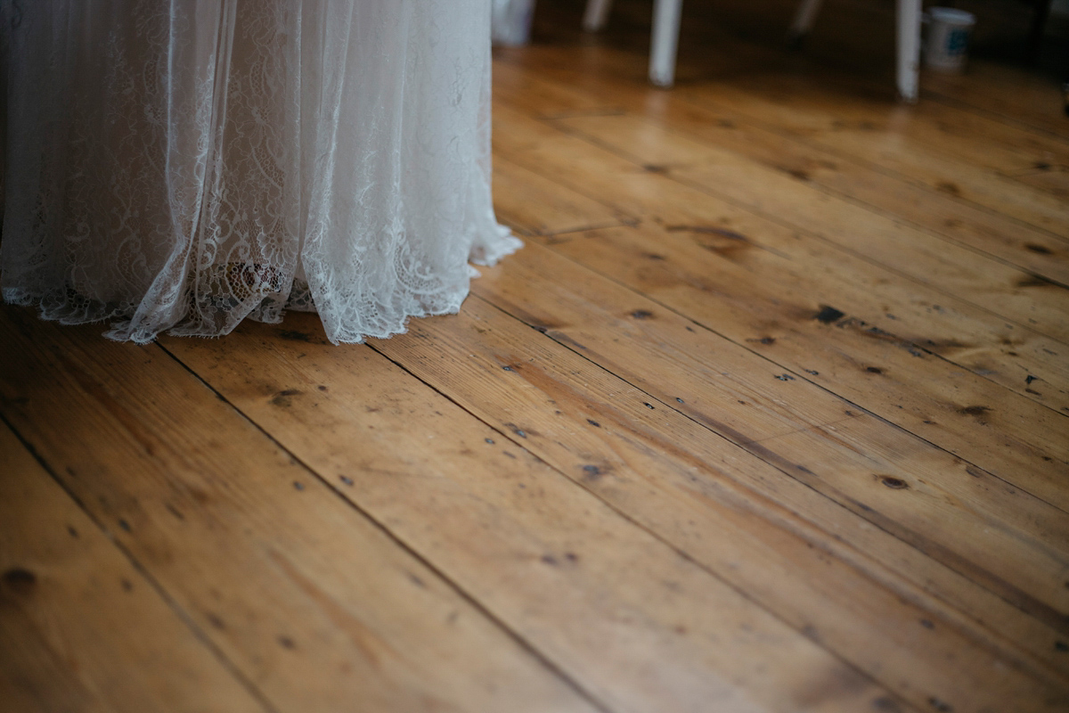 Bride Grace wore a pair of yellow shoes and a Kate Beaumont gown for her wedding in Sheffield. Images by Kindred Photography.