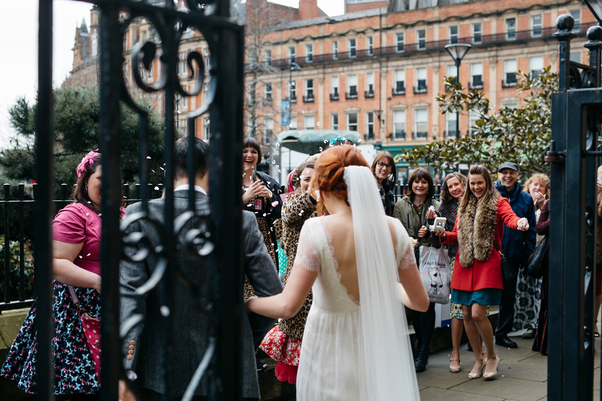 Bride Grace wore a pair of yellow shoes and a Kate Beaumont gown for her wedding in Sheffield. Images by Kindred Photography.