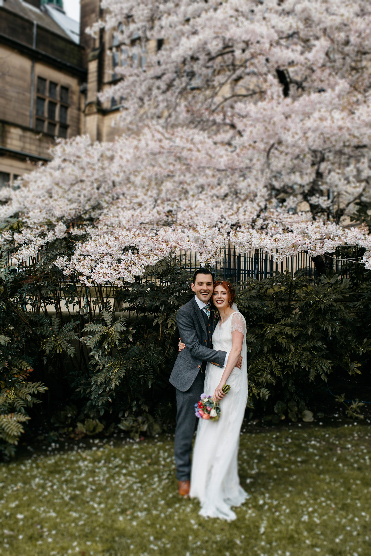 Bride Grace wore a pair of yellow shoes and a Kate Beaumont gown for her wedding in Sheffield. Images by Kindred Photography.