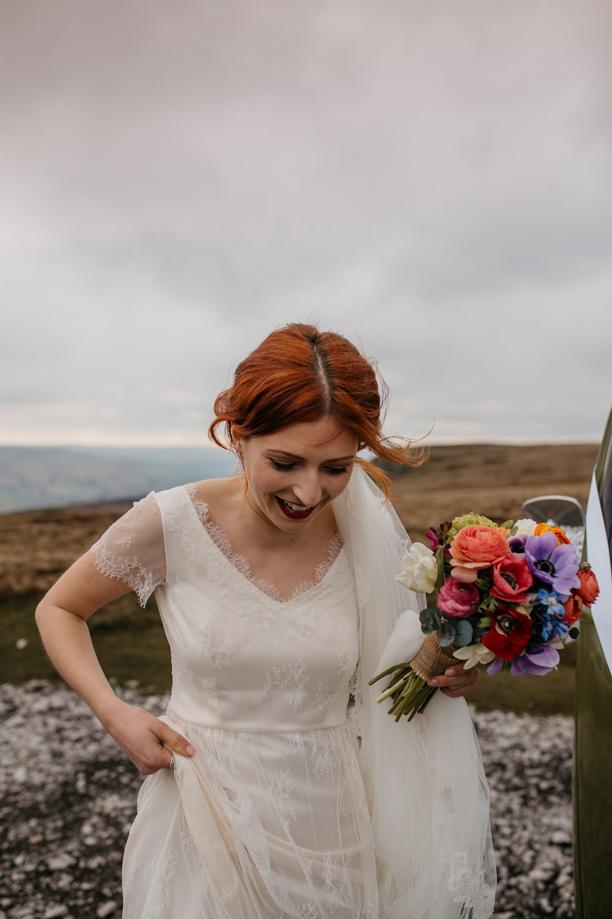 Bride Grace wore a pair of yellow shoes and a Kate Beaumont gown for her wedding in Sheffield. Images by Kindred Photography.
