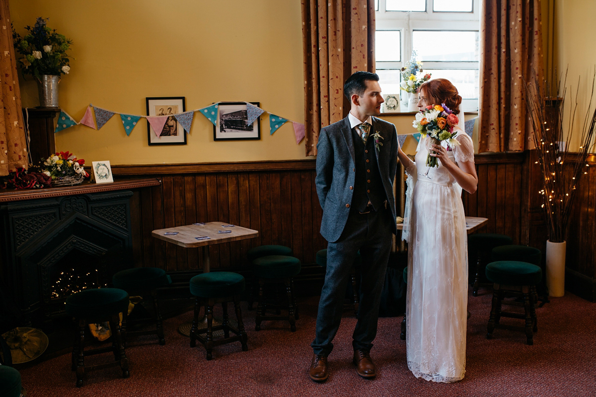 Bride Grace wore a pair of yellow shoes and a Kate Beaumont gown for her wedding in Sheffield. Images by Kindred Photography.