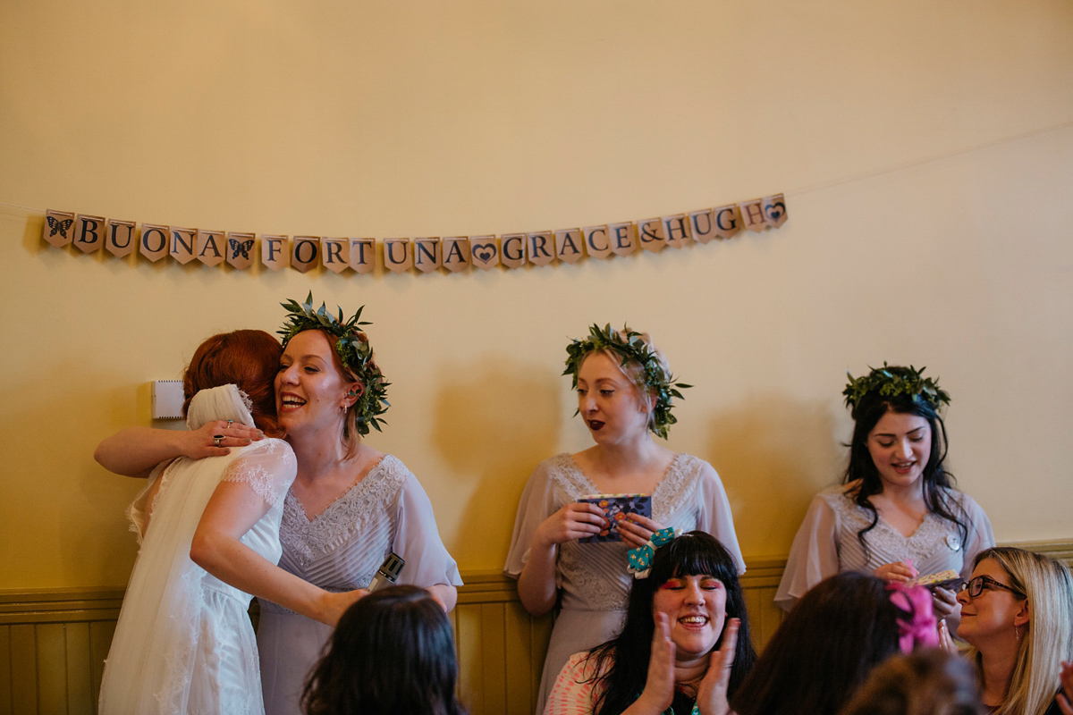 Bride Grace wore a pair of yellow shoes and a Kate Beaumont gown for her wedding in Sheffield. Images by Kindred Photography.