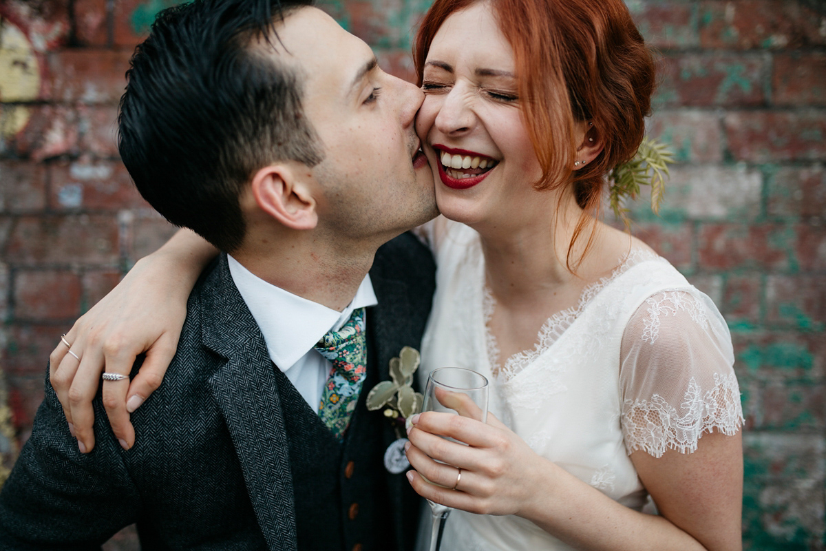 Bride Grace wore a pair of yellow shoes and a Kate Beaumont gown for her wedding in Sheffield. Images by Kindred Photography.