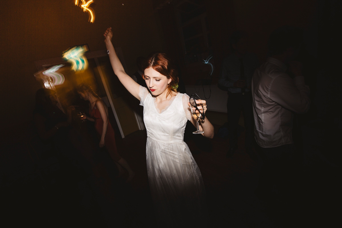 Bride Grace wore a pair of yellow shoes and a Kate Beaumont gown for her wedding in Sheffield. Images by Kindred Photography.