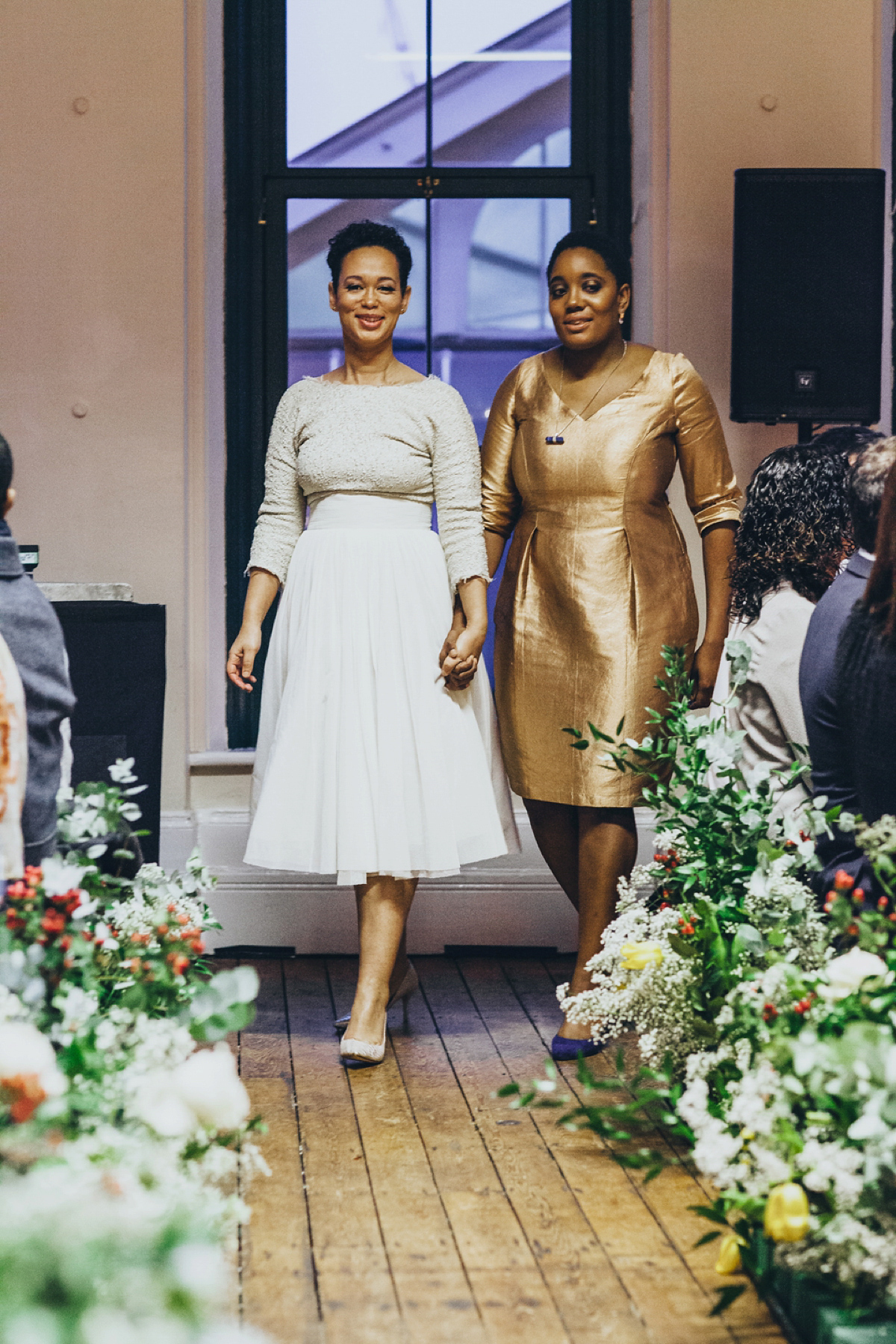 A music and food inspired West Indian inspired same sex wedding in Borough Market, London. Photography by Francesca Secolanova.