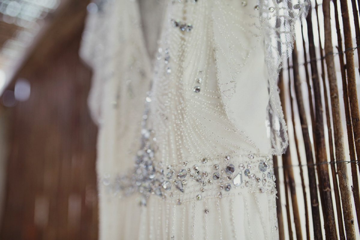 The bride wore Nicole by Jenny Packham for her intimate and relaxed wedding in Spain. Photography by Lisa Jane.